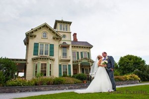 Gelmina and Ed, bride and groom in front of Jedediah Hawkins Inn., before their wedding.
